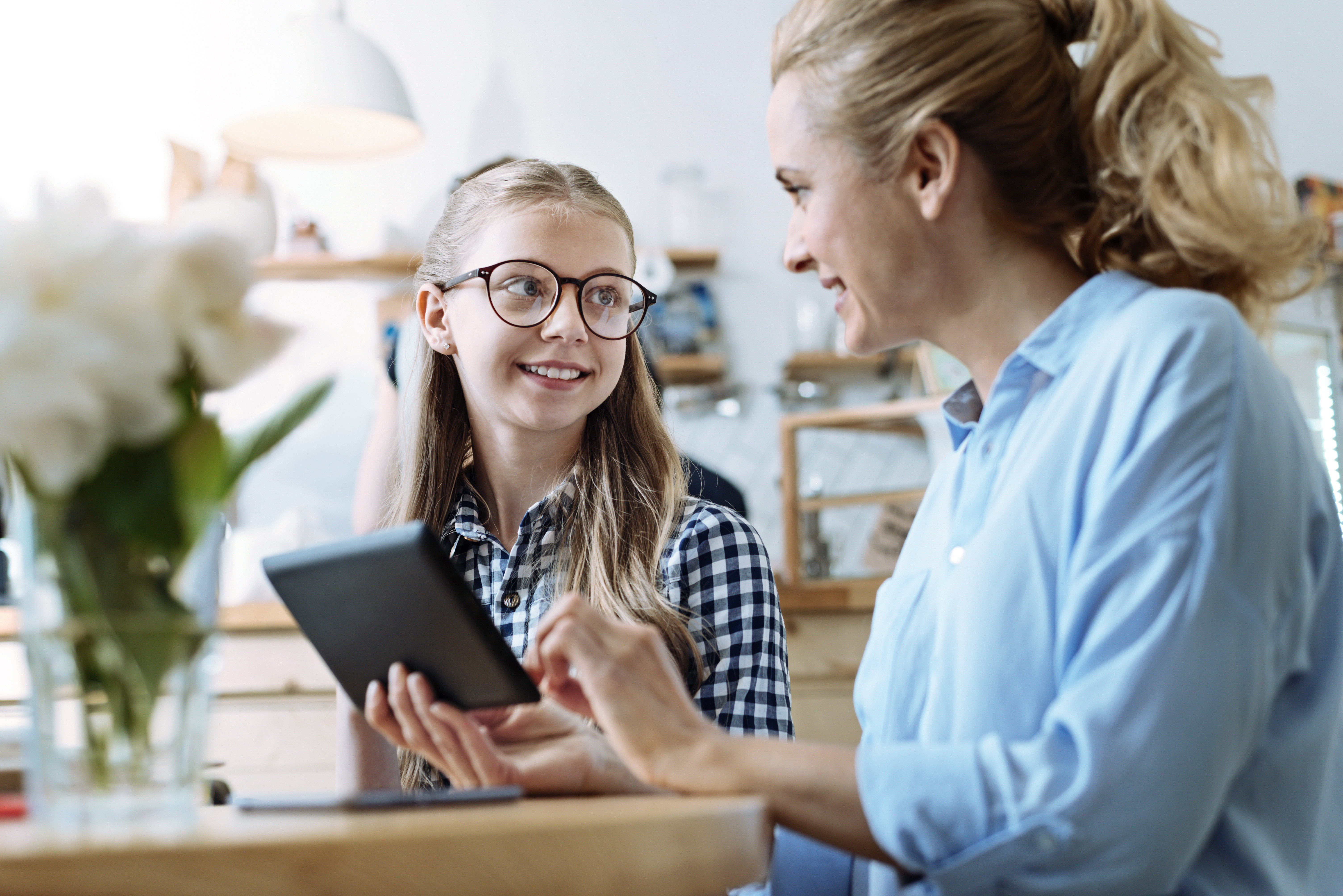 mother and daughter with a tablet